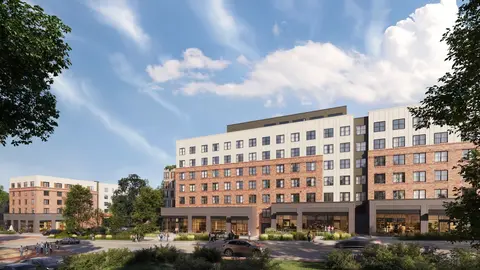 Mixed-use multifamily development with ground-floor retail activation, the type of by-right urban infill enabled by form-based zoning codes.