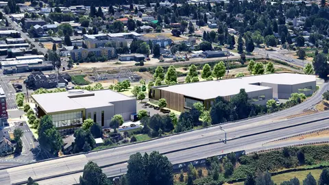 Aerial rendering of a Class A industrial warehouse complex along a major highway corridor, illustrating truck court configuration, building setbacks, and site circulation layout.