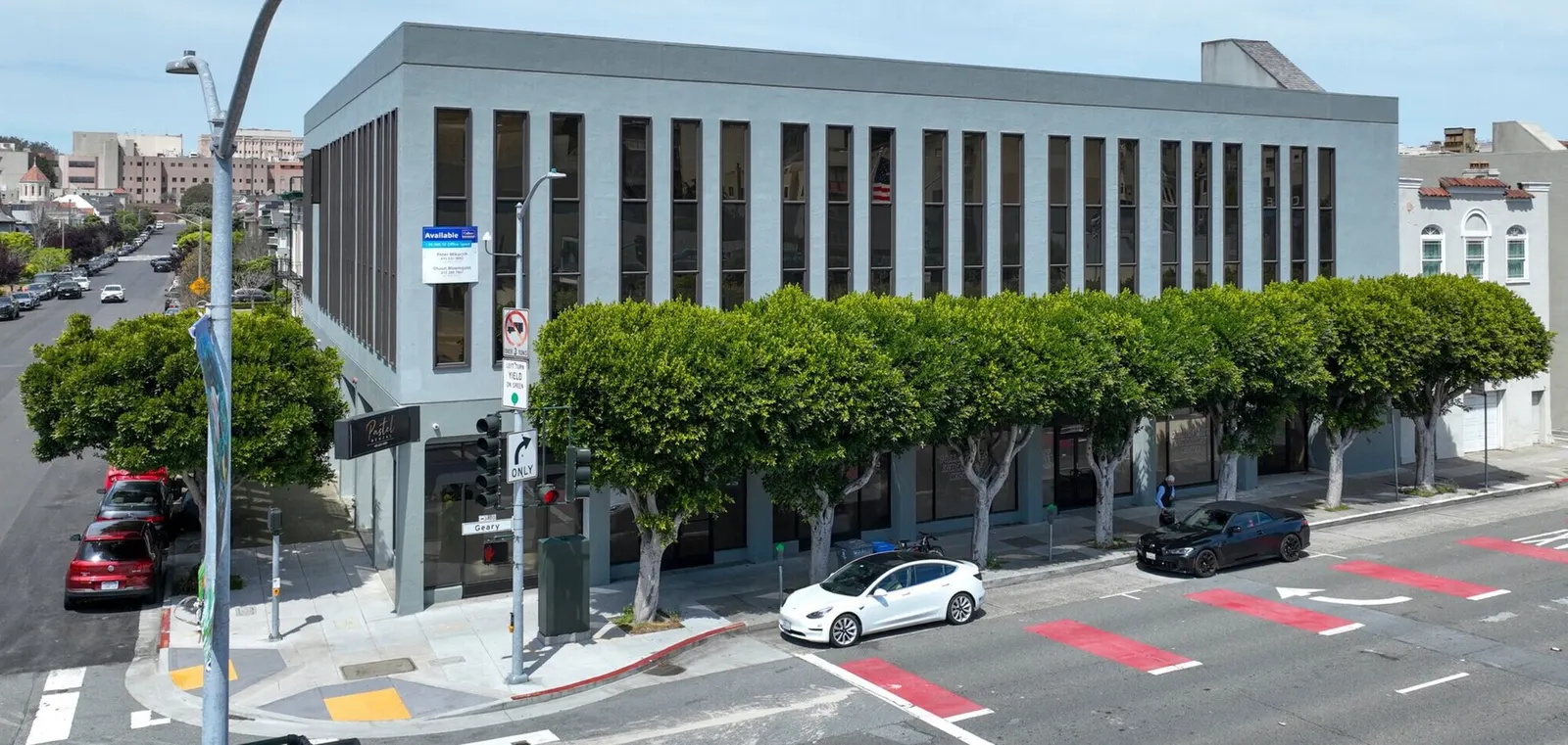 Older mid-rise office building on a city street corner