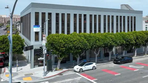 Older mid-rise office building on a city street corner