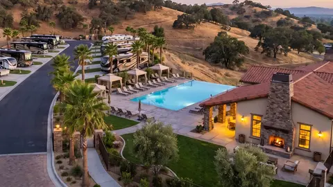 RV resort sites with utility pedestals at dusk