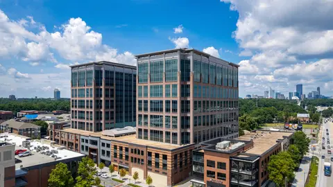 Modern U.S. office buildings with rising vacancy rates amid remote and hybrid work shift.