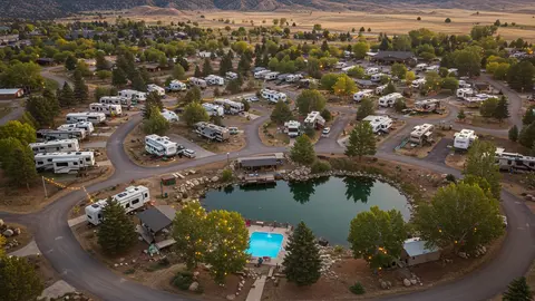 rv park with a pond and a pool